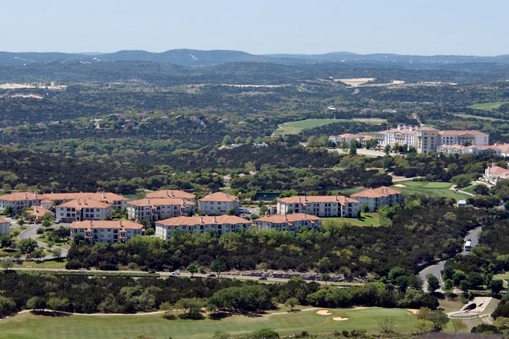 a close up of a hillside view of a city