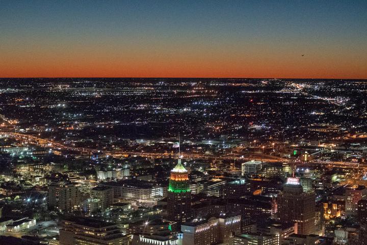 a sunset over a city